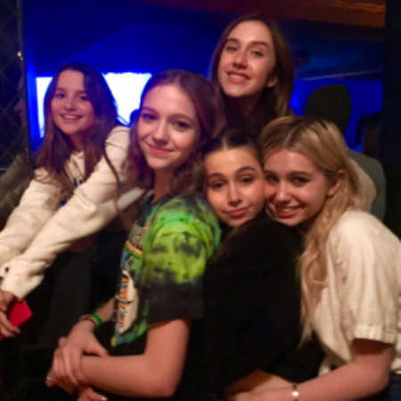 Jayden Bartels with her friends in a party.